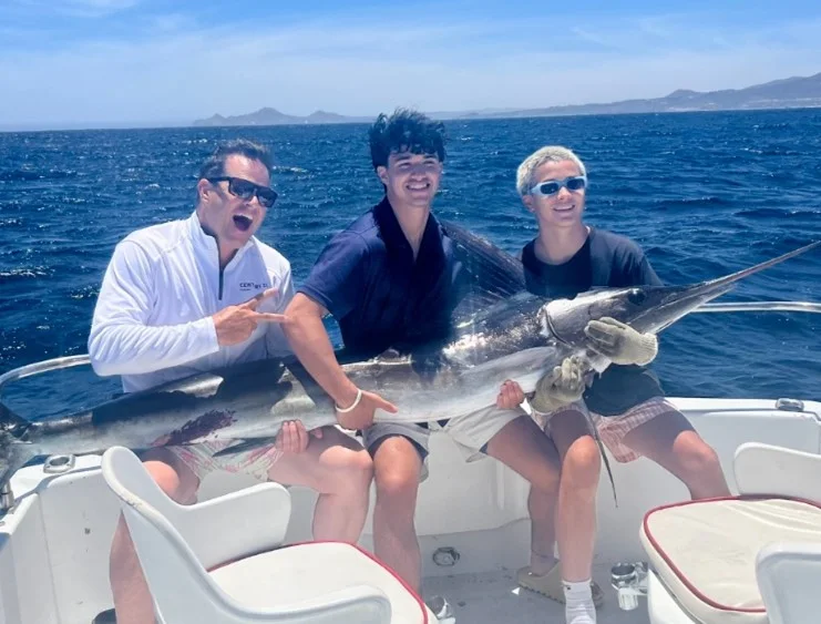 Rich Castleberry fishing in Alaska with his sons