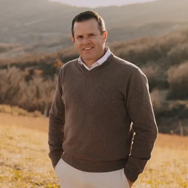 Rich Castleberry, REALTOR, standing in a foothill field